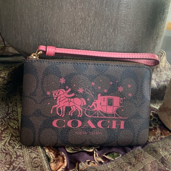 Coach Handbags - Authentic COACH Signature coach canvas/smooth leather zip around wristlet
